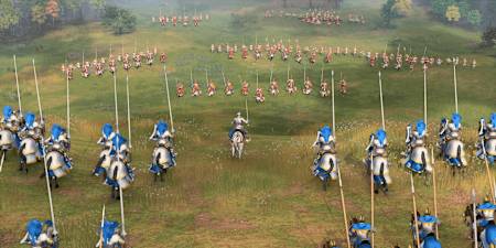 Screenshot aus Age of Empires 4 zeigt das französische Heer beim Angriff. Wir haben das Echtzeitstrategiespiel getestet.