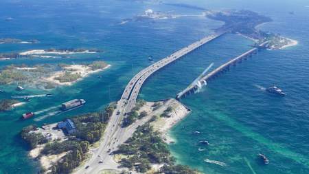 Captura de pantalla del tráiler de GTA 6 que muestra el mar y algunos puentes. 