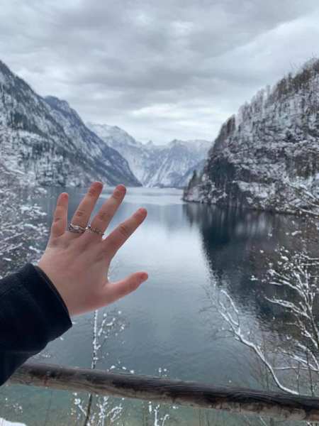 Katie Pullen shows off her engagement ring over Lake Königssee