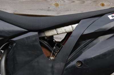 Grab holes cut into a motocross bike