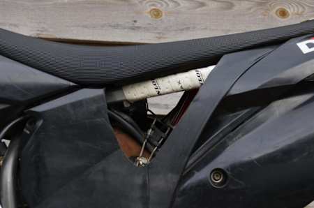 Grab holes cut into a motocross bike