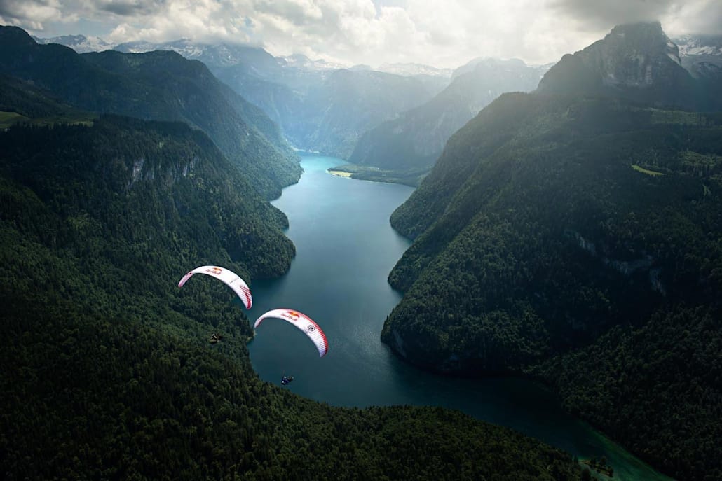 Paul Guschlbauer and Tom de Dorlodot above Lake Königssee in Berchtesgaden, Germany shot for Red Bull Illume 2016.