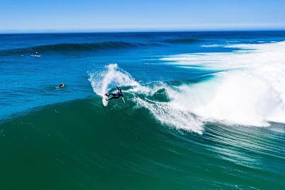 Kanoa Igarashi performs a top turn while surfing in France