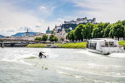 Wakeboarder Dominik Hernler performs on the Salzach River in Salzburg, Austria during filming of his video Sound of Wake.