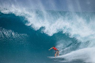 Jack Robinson rides the tube at Backdoor during the Lexus Pipe Pro