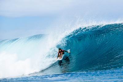 Caitlin Simmers rides the tube at Pipeline during the 2024 Lexus Pipe Pro