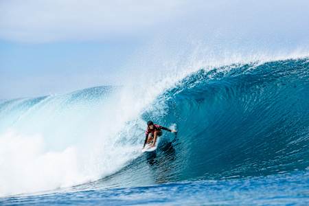 Caitlin Simmers rides the tube at Pipeline during the 2024 Lexus Pipe Pro