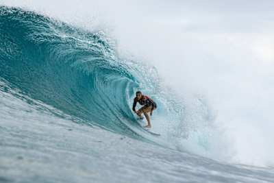 Molly Picklum rides the tube at the Hurley Pro Sunset Beach