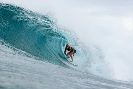 Molly Picklum rides the tube at the Hurley Pro Sunset Beach