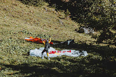 FMX pilot Tom Pagès celebrates after performing the first of his FMX BASE jumps in Avoriaz, France.