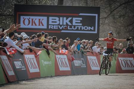 A bike athlete racing at a OKK Bike Revolution event.