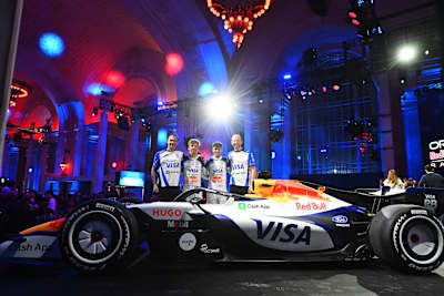 Team bosses Alan Permane and Peter Bayer join Arvid Lindblad and Liam Lawson at the team's season launch at Michigan Central Station on January 15, 2026 in Detroit, Michigan.