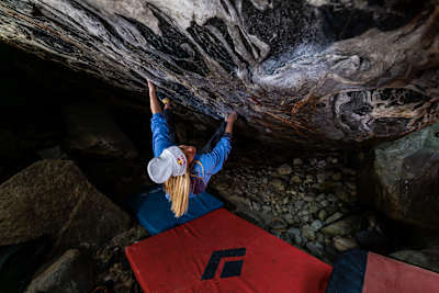 Shauna Coxsey tackles a bouldering route during the Red Bull Bouldering Camp in Ticino, Switzerland in November 2025.