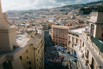The iconic Red Bull Cerro Abajo brings thrilling downhill action to the vibrant streets around Teatro Nazionale Genova, Italy, on August 24, 2025, attracting an energetic crowd