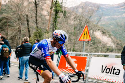 Florian Lipowitz of Red Bull – BORA – hansgrohe leads through Stage 6 (Berga – Queralt) at the 105th Volta a Catalunya in Spain, March 2026, displaying relentless speed and teamwork