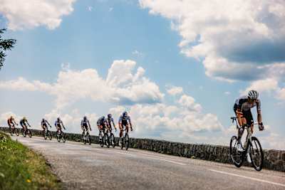 Jan Tratnik, Nico Denz, Remco Evenepoel, Maxim Van Gils, Florian Lipowitz and Tim Van Dijke of Red Bull – BORA – hansgrohe charge through France during Stage 14 of the 113th Tour de France 2026. 