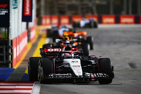 Liam Lawson driving the Scuderia AlphaTauri AT04 on track during the F1 Grand Prix of Singapore at Marina Bay Street Circuit on September 17, 2023 in Singapore, Singapore.