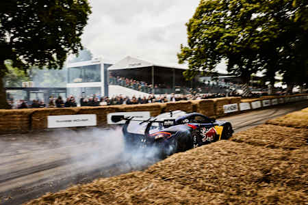 Mike Whiddett drifting his MADMAC car at Goodwood Festival of Speed
