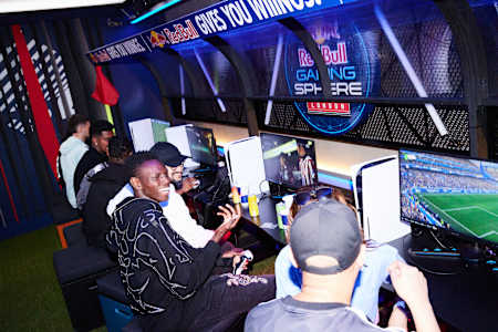 On September 19, 2025, Lil Jr enjoys a triumphant EA Sports FC26 win during a gaming event at Red Bull Gaming Sphere London.