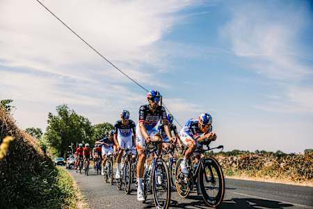 Red Bull – BORA – hansgrohe cyclists are seen in action during the first Rest Day of the 113th Tour de France. 