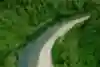 A team of racers from Costa Rica navigates a tropical river on the sixth day of Eco-Challenge.