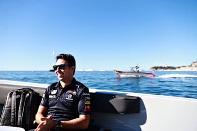 Checo With A Unique Arrival To The Paddock