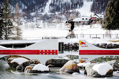 Pierre Vaultier performs a snowboard frontflip on a unique pumptrack above a frozen lake in Serre Chevalier, as part of his Floating Shapes project.
