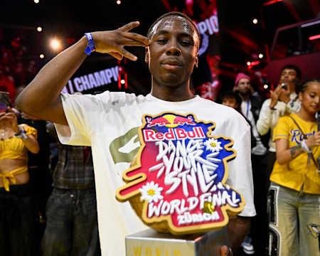 Willis celebrates with the trophy after winning Red Bull Dance Your Style World Final 2026, in Zurich, Switzerland