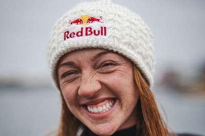 Canadian cliff diver Molly Carlson is all smiles after becoming the first woman to dive from an iceberg floating off the coast of Newfoundland, Canada, in 2026.