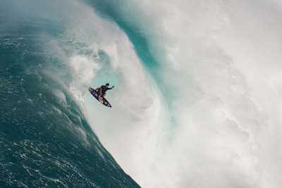 Kai Lenny on a big wave in Peahi, on Maui, Hawaii.