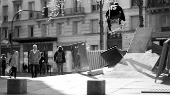 Tom Belot Ollie Tailgrabs out of a Parisian sculpture.