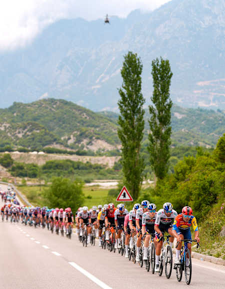 The pack rides during Stage 3 of the Giro d’Italia from Valona to Valona, Albania on Sunday, May 11, 2025.