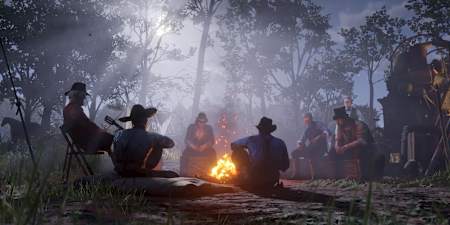 Captura de pantalla de Red Dead Redemption 2 que muestra a la banda en la hoguera. Te presentamos los mejores mods para el juego.
