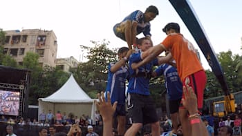 Descending from a human pyramid