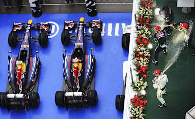 Mark Webber and Sebastian Vettel celebrate Red Bull Racing's first victory in F1 at the 2009 Chinese Grand Prix in Shanghai