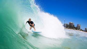 Surfer Mick Fanning gets tubed on Australia's Gold Coast.