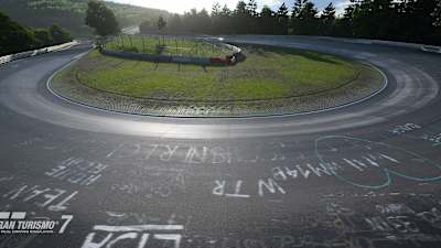 Screenshot from Gran Turismo 7 showing the Caracciola carousel in the sunshine. 
