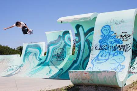 Nora Vasconcellos does a Backside Air in Portugal.