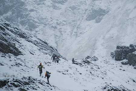 Image of competitors cross an Andean pass during the Patagonian Expedition Race