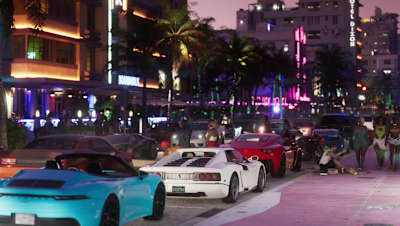 Screenshot aus dem GTA 6 Trailer zeigt verschiedene Autos auf einer Straße in Vice City bei Nacht.