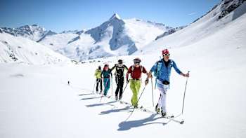 An image of participants in Red Bull Der Lange Weg crossing the main ridge of the Alps from Vienna to Nice.