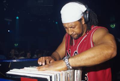 The NYC hip-hop legend DJ Kool Herc shows a new generation how it's done in Blackpool, UK, in 2000.
