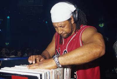 The NYC hip-hop legend DJ Kool Herc shows a new generation how it's done in Blackpool, UK, in 2000.
