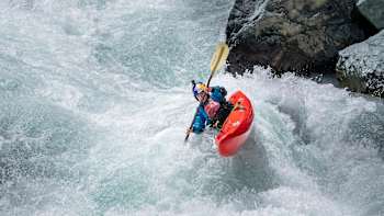 Nouria Newman gets sideways while paddling rough water in India.