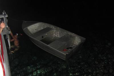 Here you can see the lifeboat, with room for six people only. This photo was taken on the first day of the trip, when we got stuck on a coral reef. The crew got in the water but found no damage.