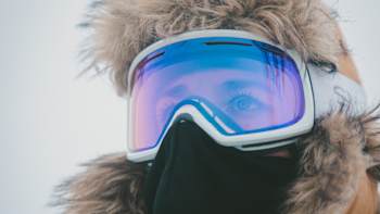 Cyclist Lael Wilcox poses for a portrait in protective winter gear