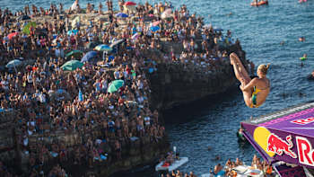 Rhiannan Iffland performs a cliff dive at Polignano A Mare, Italy on August 28, 2016.