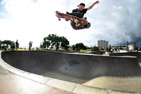 Troubling air traffic control above Melbourne, Zepp Heyes floats a huge trailing-hand grab at St Kilda's iconic skatepark.
