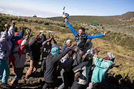 A hero’s welcome greets Rozov on landing