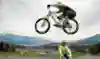 Thomas Öhler bunny hops over Rob Warner